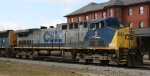 CSX 2 leads a train northbound past the station